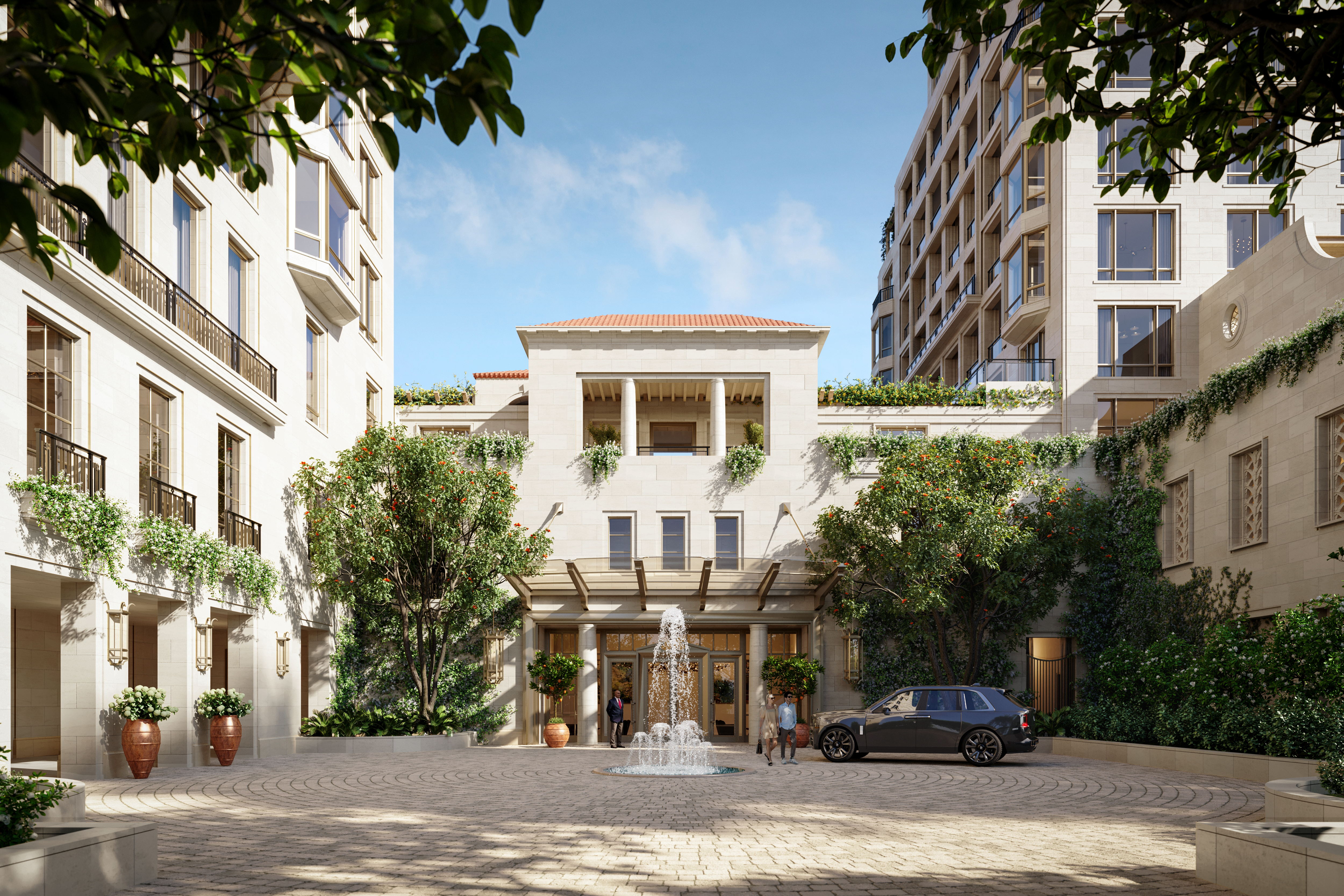 Elegant motor court entrance with lush landscaping at South Flagler House